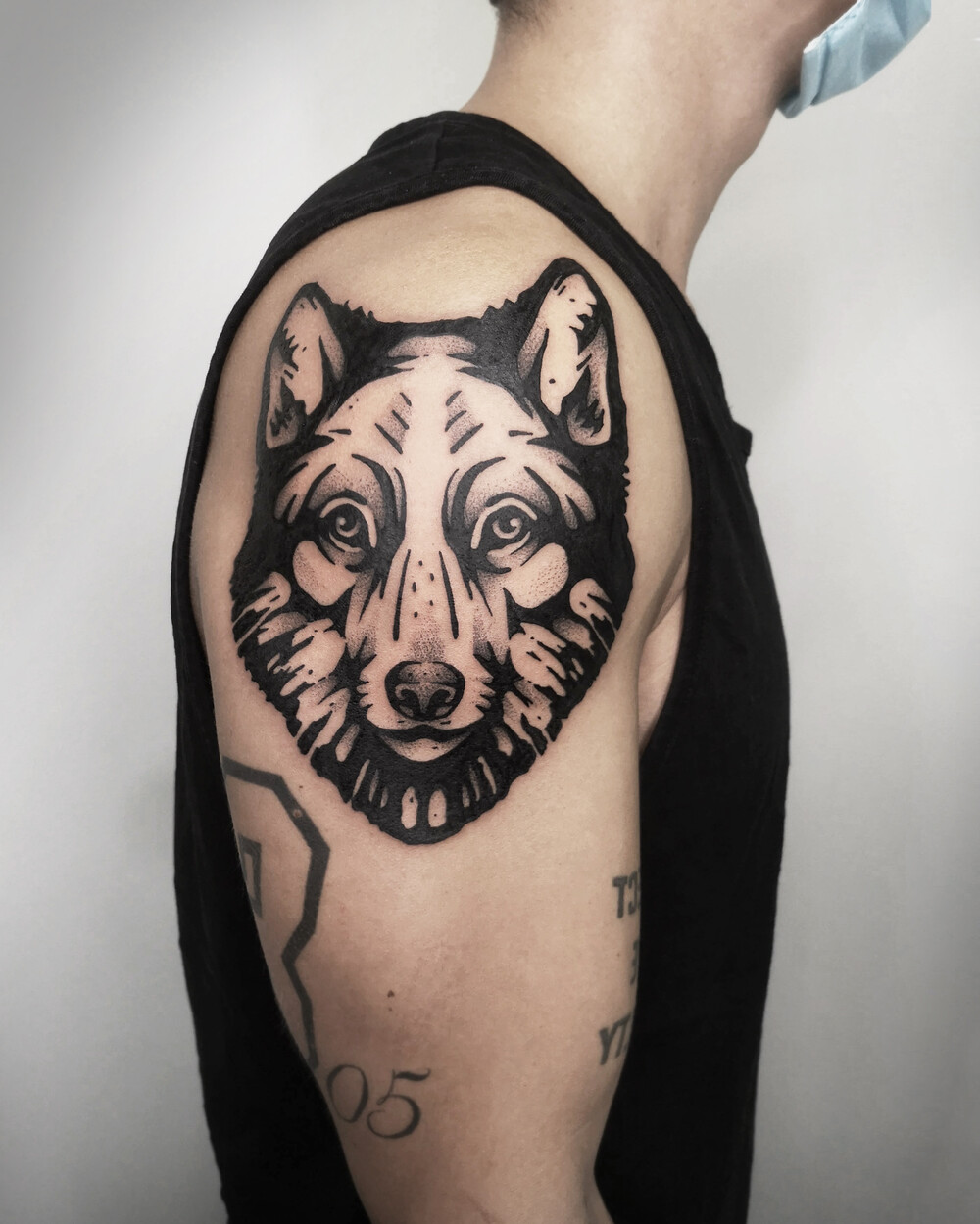 Wolf wolfhead tattoo in Blackwork Holzschnitt Linocut style by Christian Eisenhofer - Tattoo Berlin
